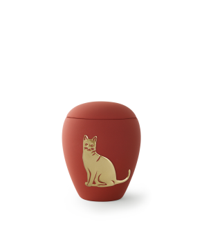 Katzenurne aus Keramik mit samtiger Oberfläche und goldenem Katzen-Relief, einmal geschlossen und einmal mit brennendem Gedenklicht.